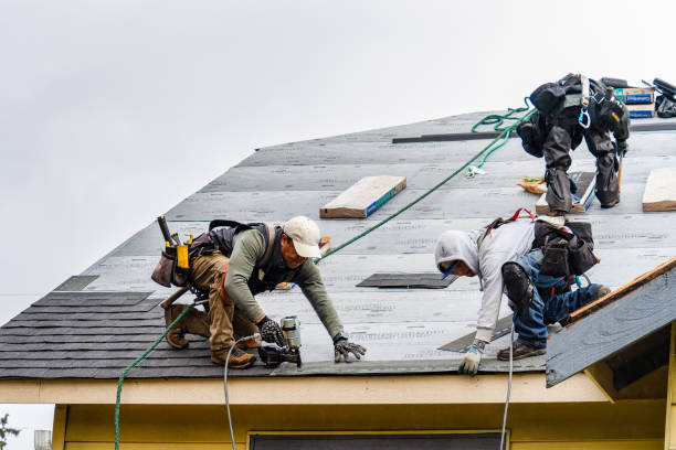 Professional Gutter Installation technician working in East Middlebury, VT